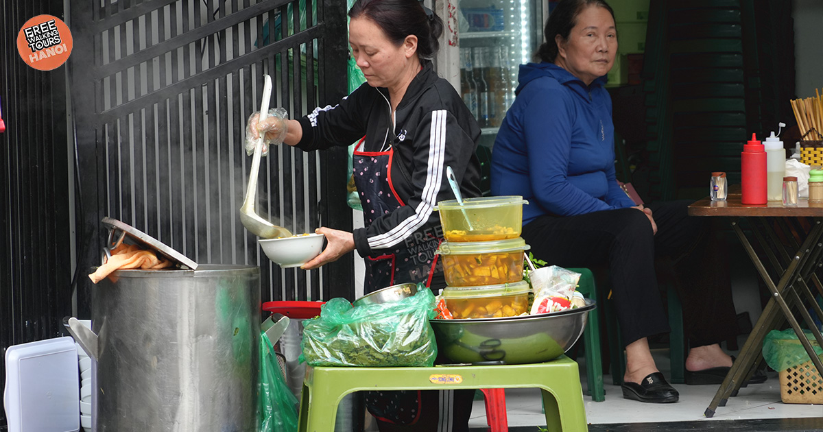 Hanoians gathered around steaming hotpots on a cold winter day in the Old Quarter.